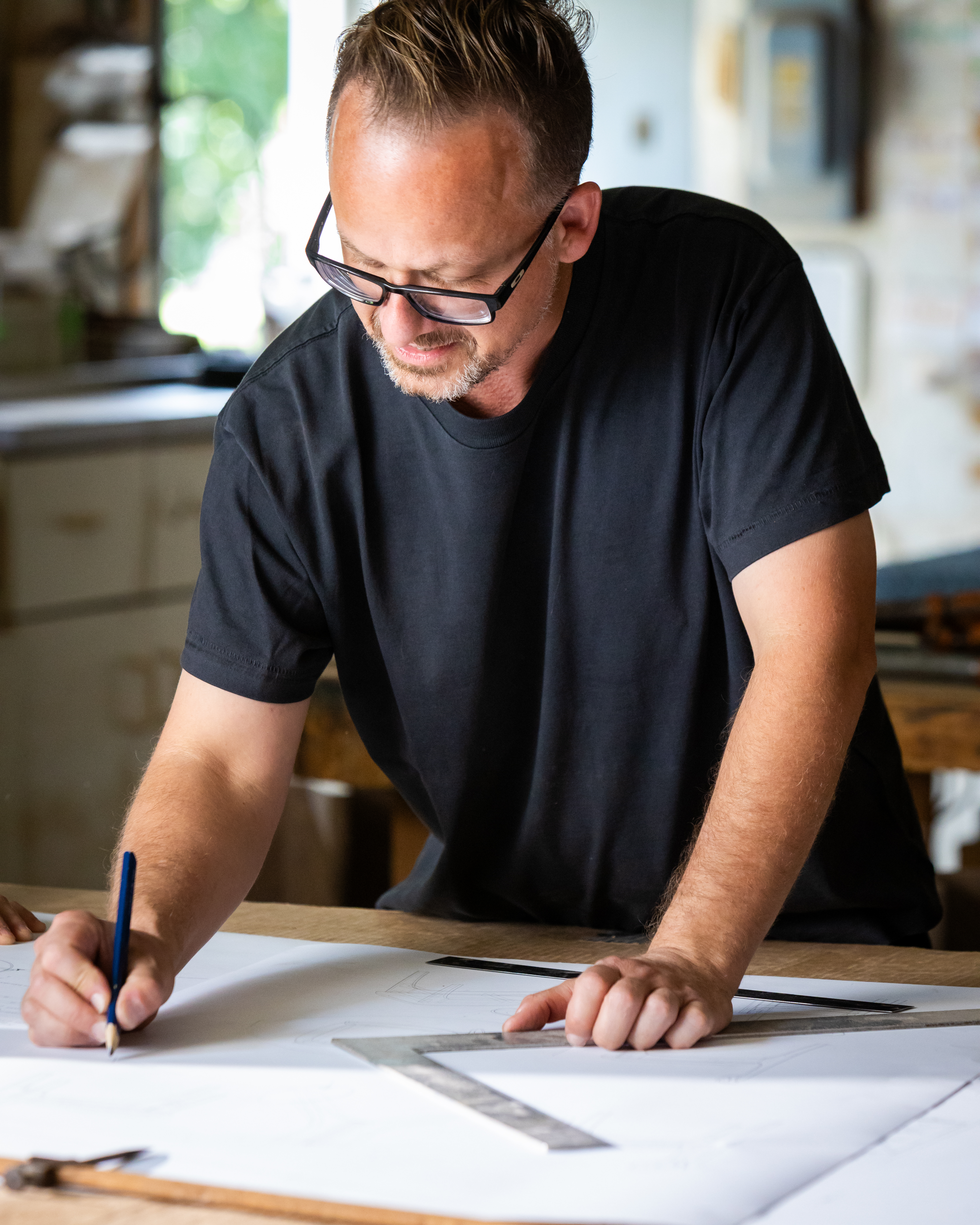 Nathan Hunter at his drafting table.