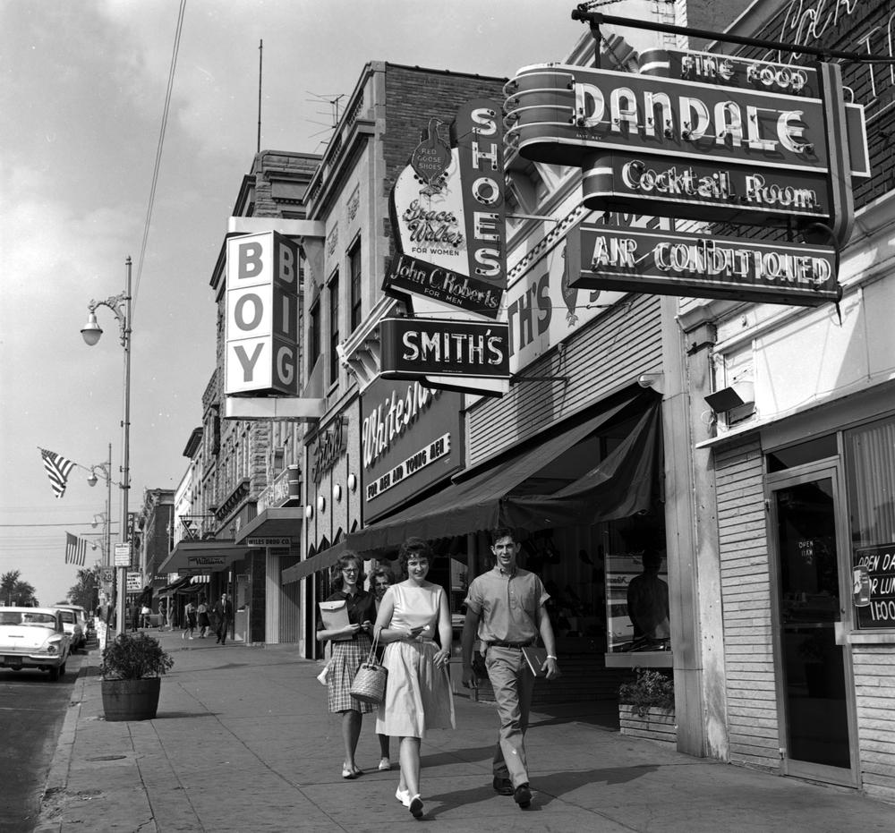 Pedestrians outside the Dandale restaurant, Bloomington square