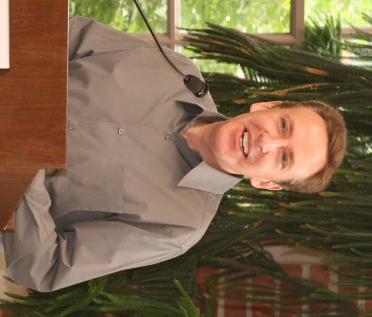 Former Indiana state legislator and former Bloomington mayor Mark Kruzan speaking at a lectern.