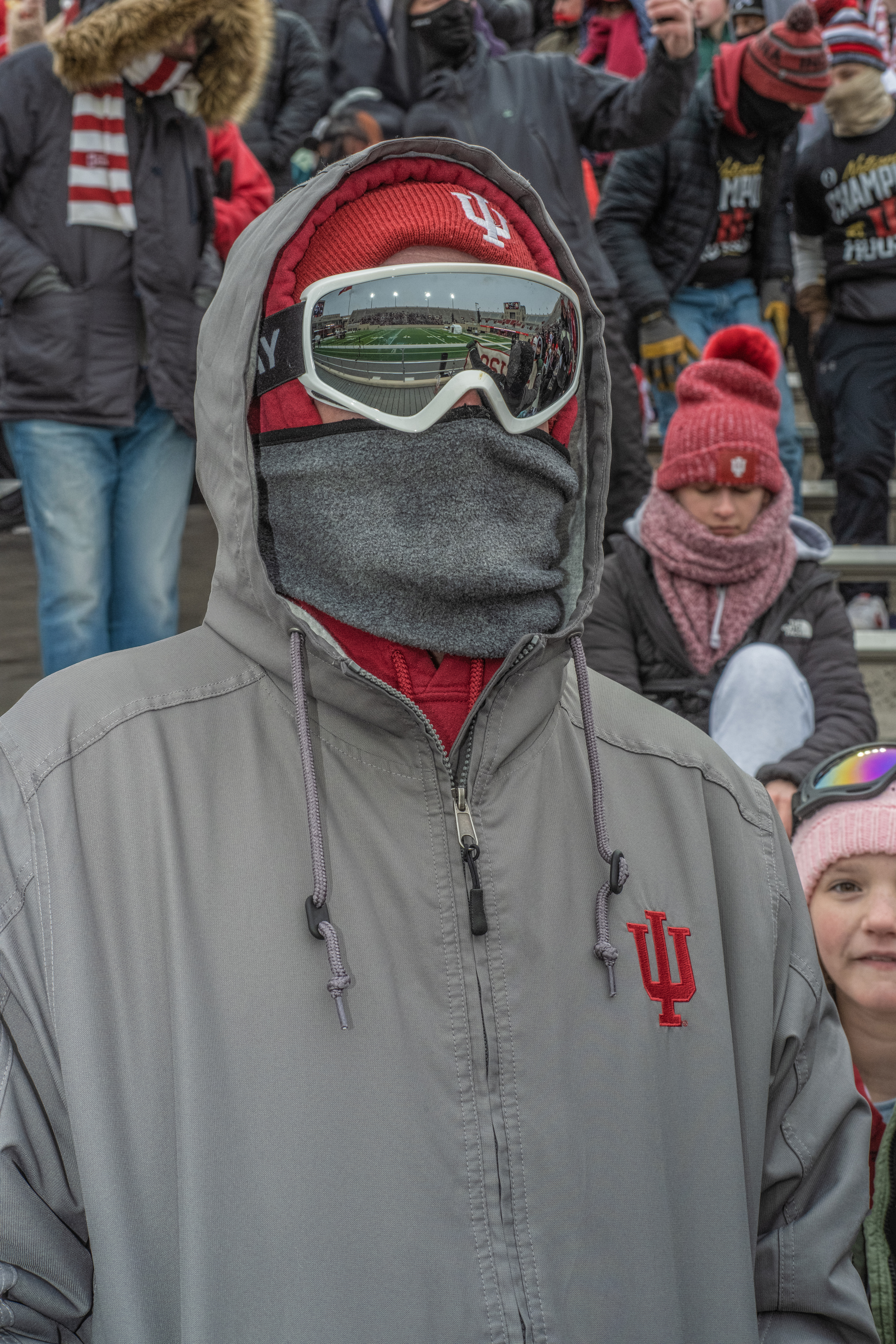 Fans wear IU-branded winter weather gear on Saturday to keep out the cold while staying in style.