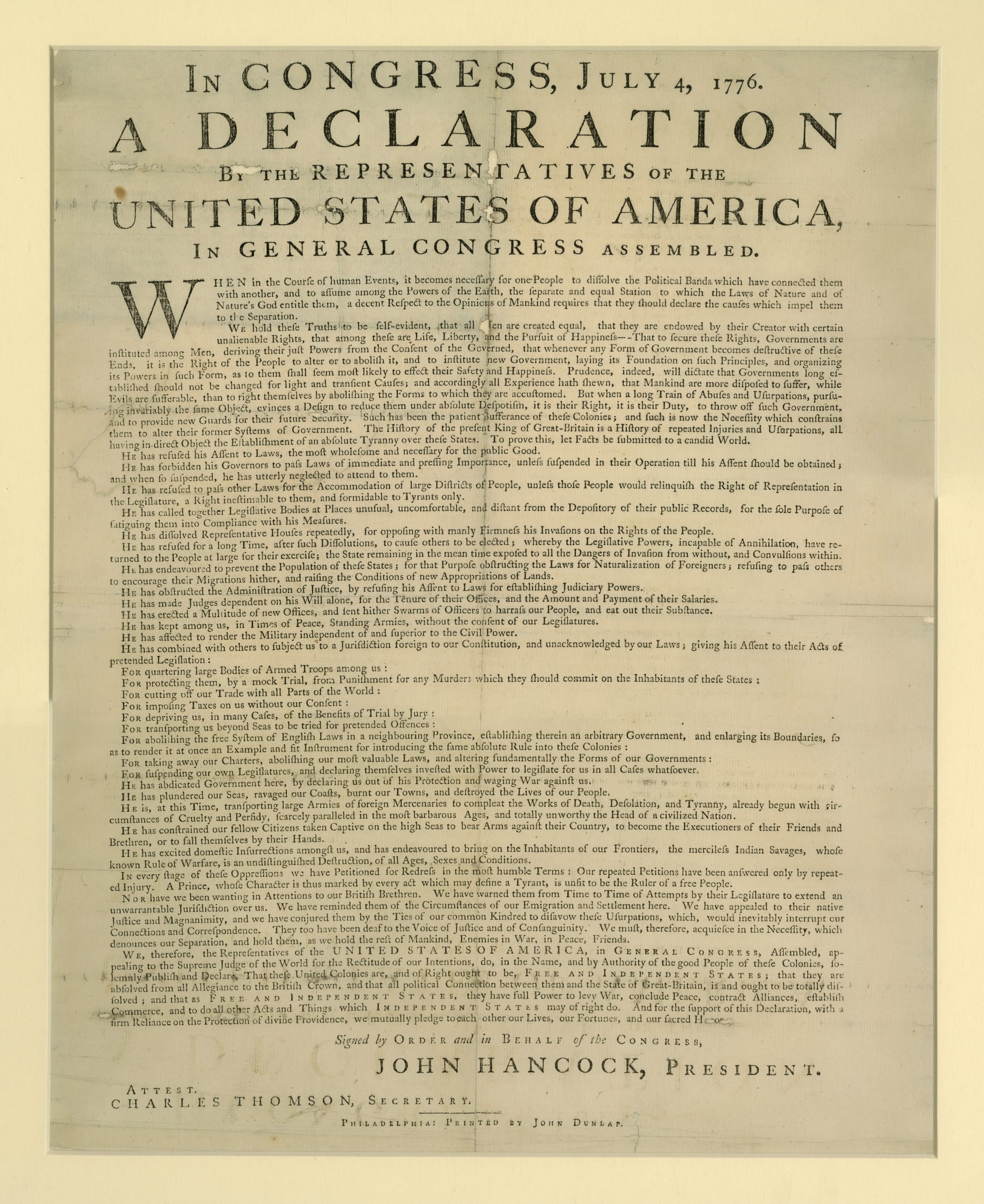 A sepia-toned printed copy of the Declaration of Independence