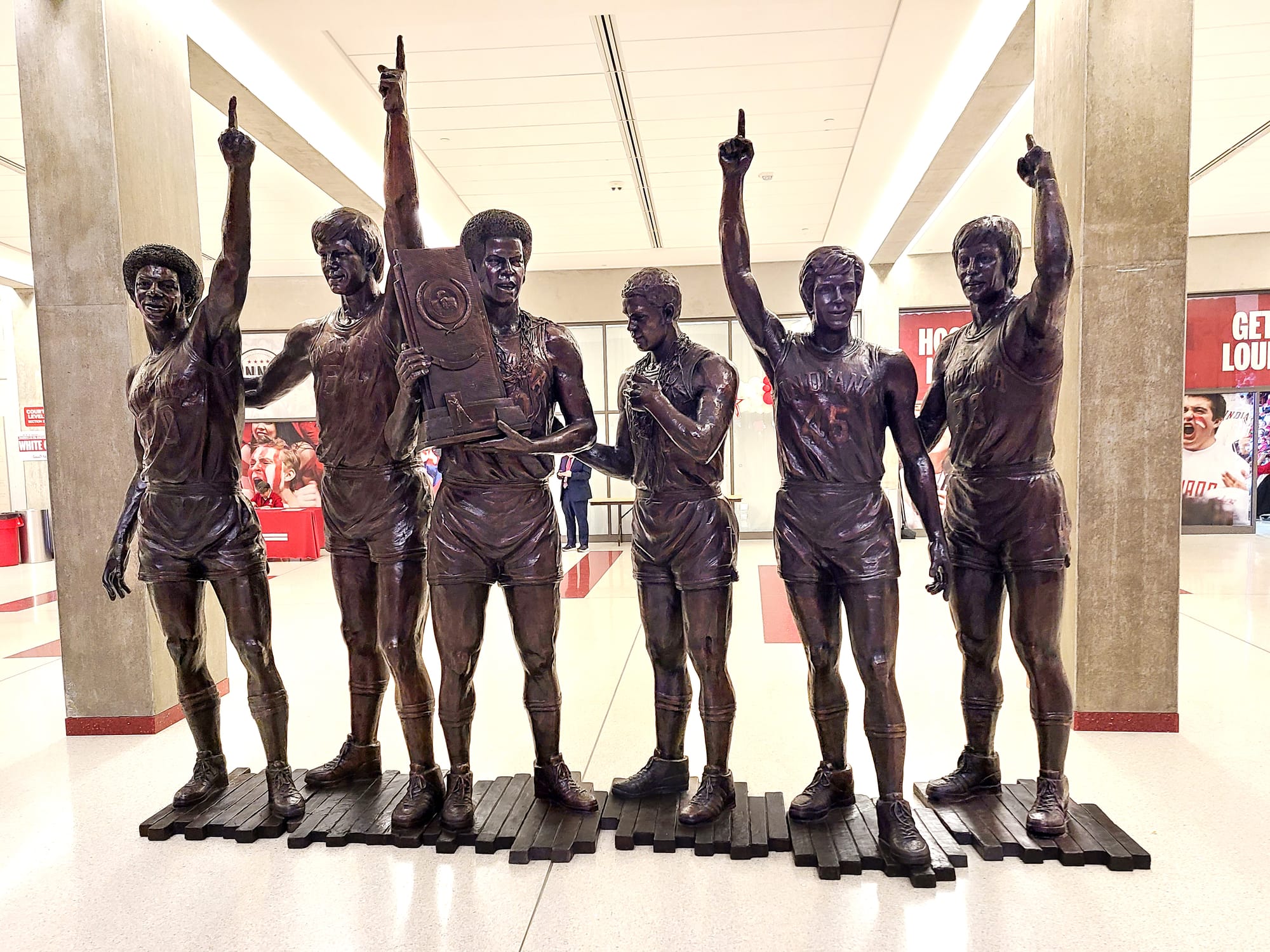 a bronze sculpture depicts IU basketball players Bobby Wilkerson, Kent Benson, Scott May, Quinn Buckner, Jim Crews, and Tom Abernethy