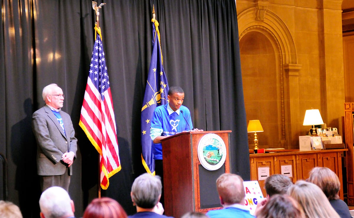 Dorian Phillips shares his experience in the Monroe County CASA program at the CASA Day rally at the Indiana Statehouse in Ma