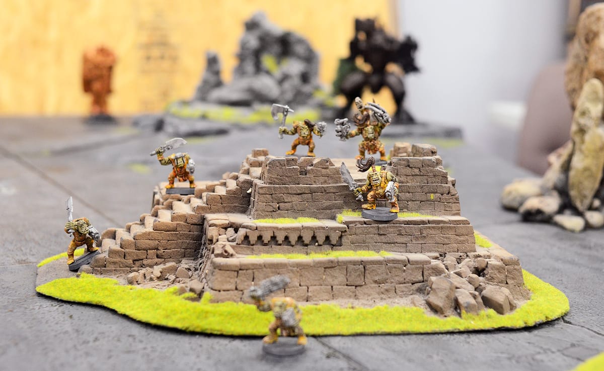 Orks stand their ground in "Warhammer 40,000" in the downstairs gaming rooms of The Game Preserve. There are a variety of opp