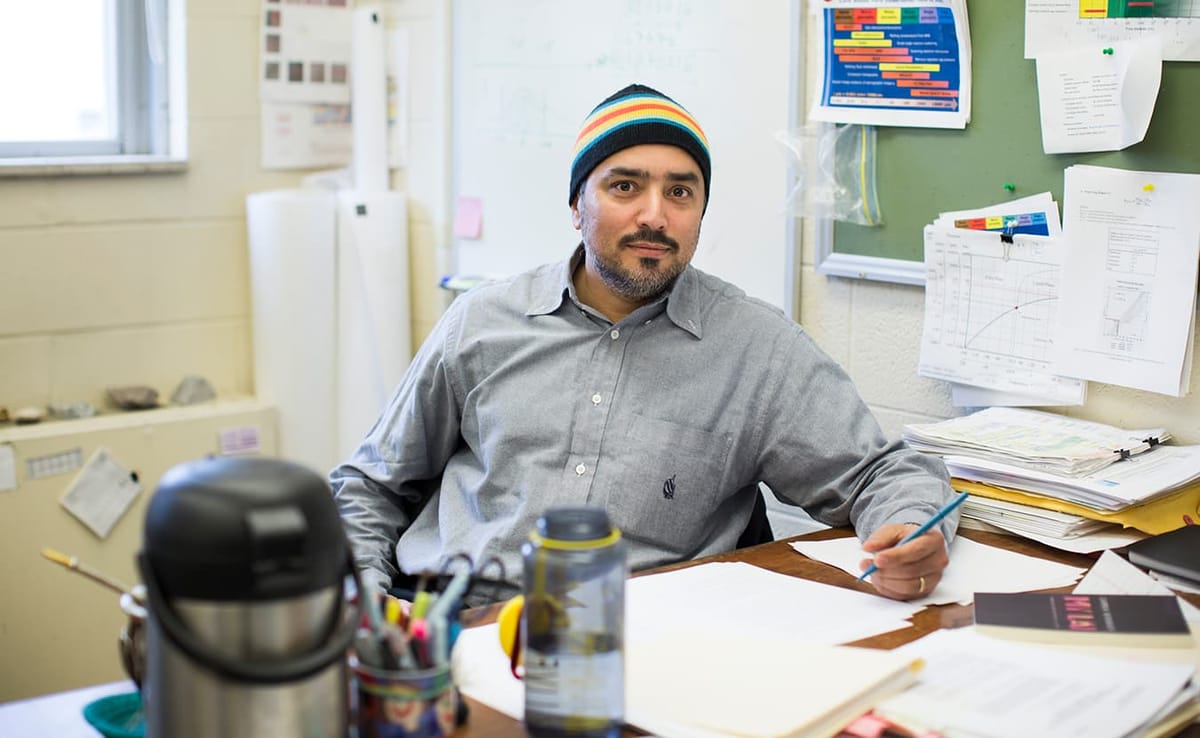 Cristian Medina, a poet, cook, IU researcher, and chess leader from Arica, Chile, moved to Bloomington in the mid-2000s. Pict