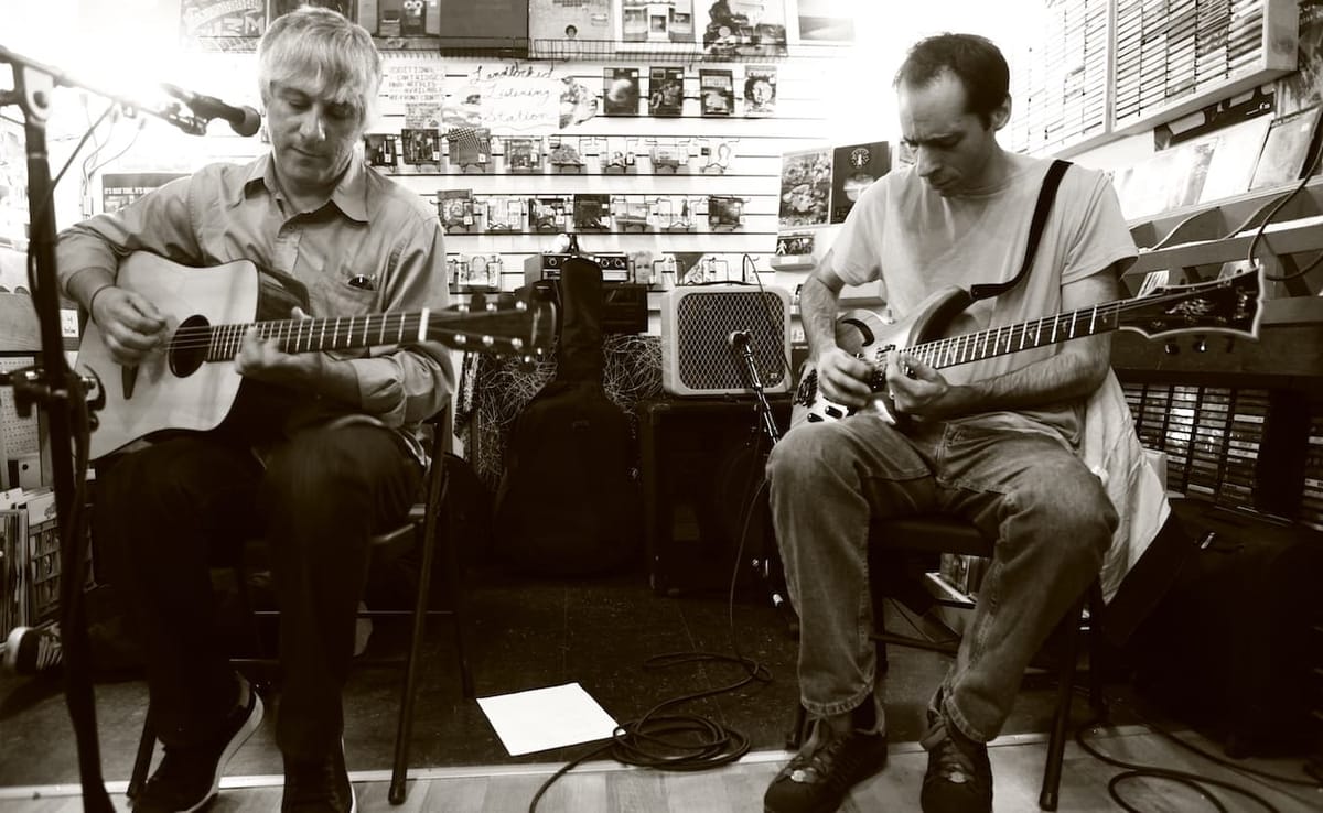 Lee Ranaldo (left) of Sonic Youth plays at Landlocked Music in 2012. Ranaldo also recited a poem about Bloomington that he ha