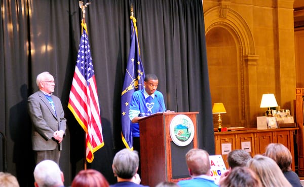 Dorian Phillips shares his experience in the Monroe County CASA program at the CASA Day rally at the Indiana Statehouse in Ma