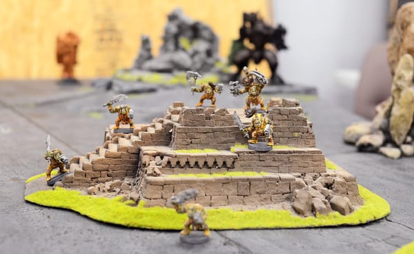 Orks stand their ground in "Warhammer 40,000" in the downstairs gaming rooms of The Game Preserve. There are a variety of opp