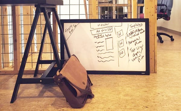 A prototype of LimestonePostMagazine.com is laid out on the whiteboard — in our first office, the 615 Collective. | Photo by