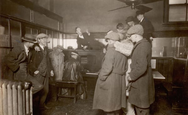 Hoagy Carmichael sits at the piano surrounded by friends in the Book Nook on Indiana Avenue, sometime in the 1920s. | Photo c