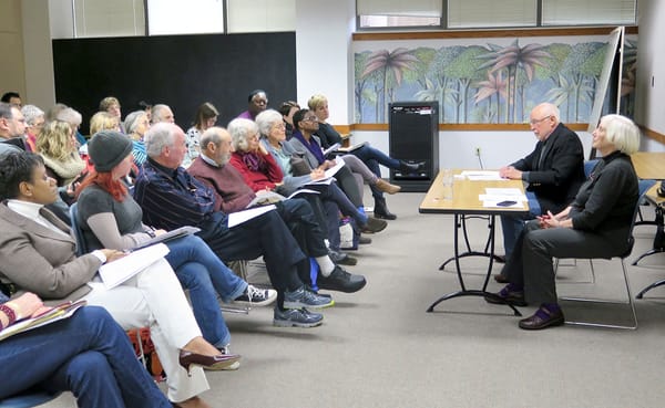 Former Bloomington Mayor Tomi Allison (far right) and Indiana University Professor Emeritus Jim Allison (second from right) s