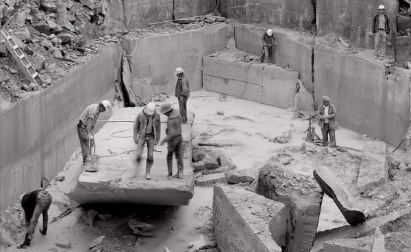 This photo by Jeffrey Wolin shows the last day of quarry season at the Independent Limestone quarry in 1983. This is one of m