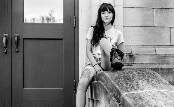 Katherine Thomas sits outside of the Monroe County History Center. | Photo by Adam Reynolds