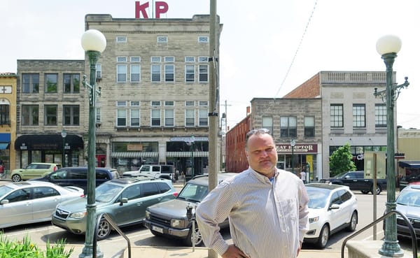 A family project of photographing Bloomington’s history became a mission for Derek Richey (pictured here on the east side of