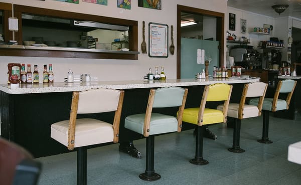 Old men yukking it up at a diner shows that “deep down inside, we’re all 12-year-olds who need something solid and predictabl