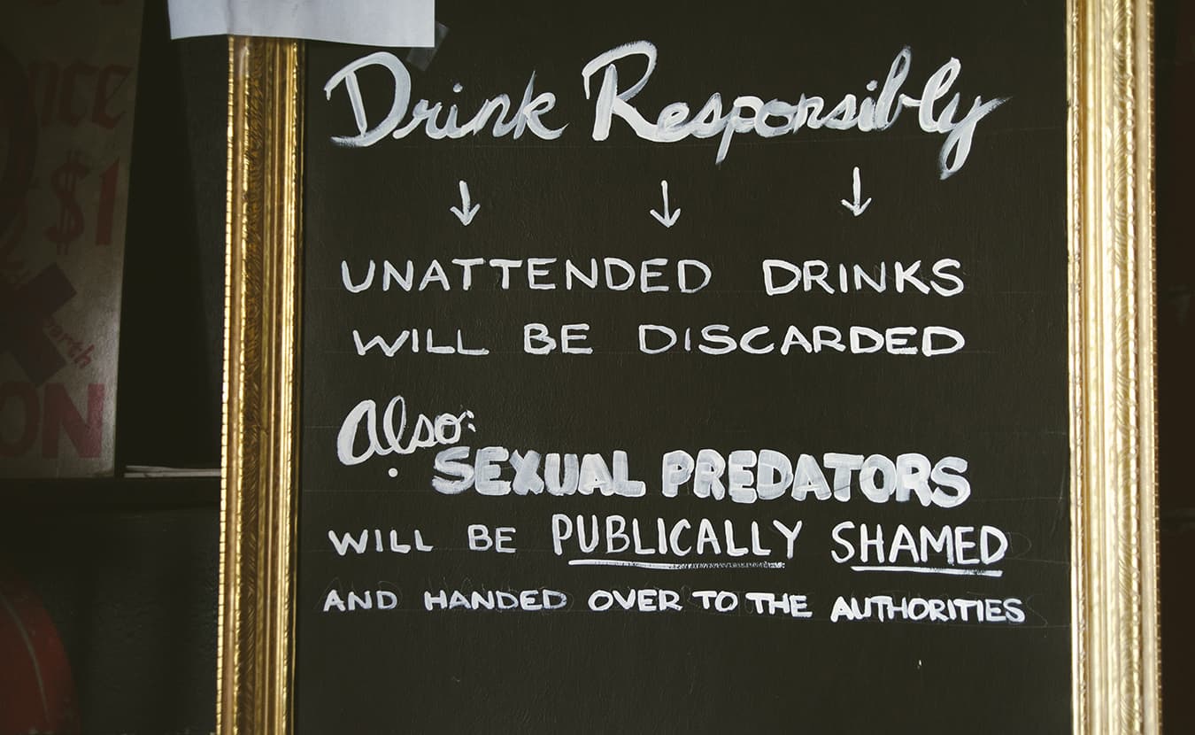 The Back Door has a variety of signs to help patrons feel more empowered to speak up if they see something going on. | Photo by Natasha Komoda