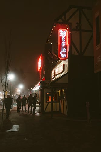 “In a college town and in the bar life, we have to use our common sense of things that we’ve seen over and over — our common sense as the sober people who are serving drinks,” says Dylan Swift, manager of Nick's English Hut. | Photo by Natasha Komoda