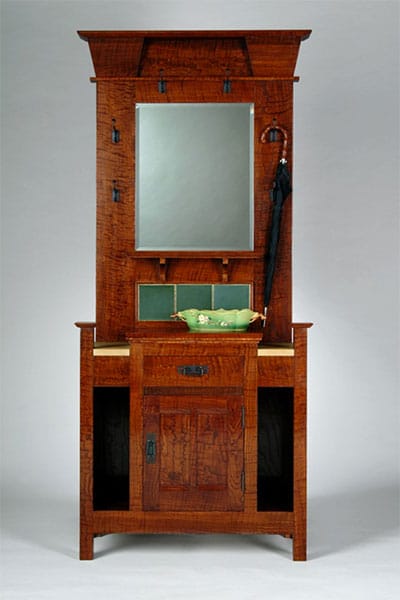 This hallstand, by Hiller, is based on an English Arts & Crafts original. | Photo by Kendall Reeves, <a href="http://spectrumstudioinc.com/" target="_blank">Spectrum Studio</a>