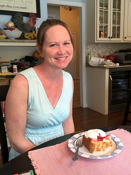 Noelle Zeichner with a slice of sour cream pound cake — her mother's recipe. | Photo by Ruthie Cohen