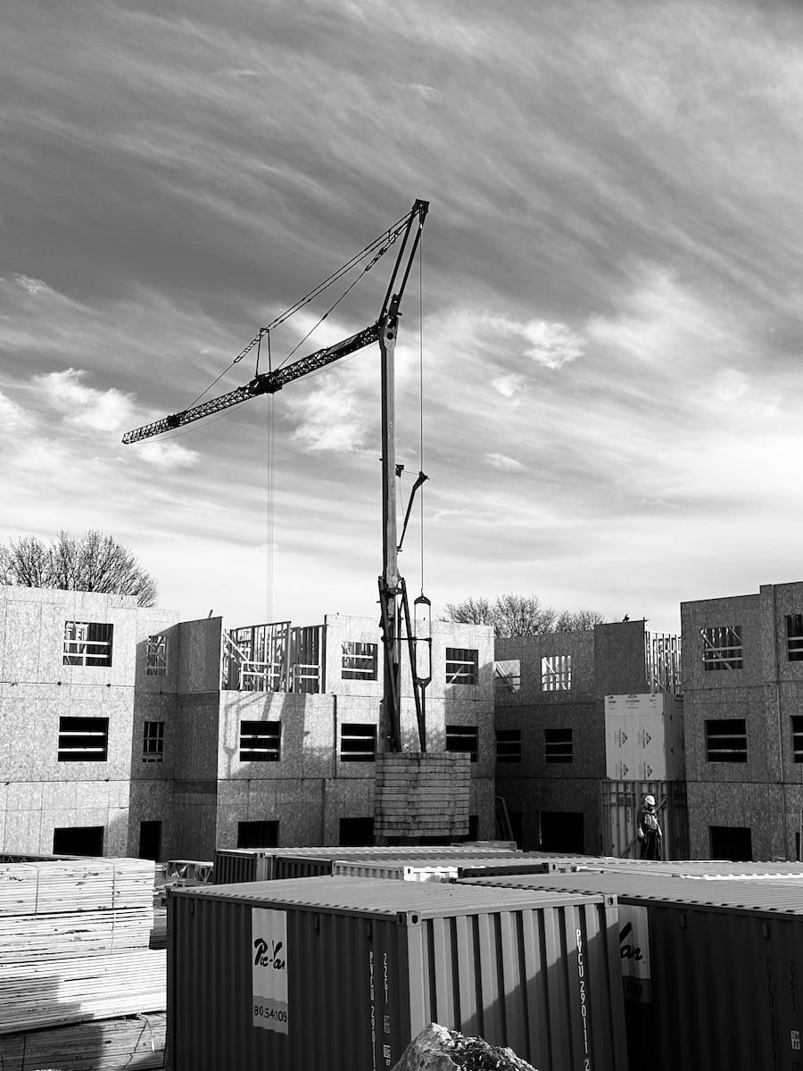 The Arch, an affordable rental community on the city’s north side, was razed to make room for the construction of these higher-priced student apartments with “resort-style amenities.” | Photo by Jason Vest