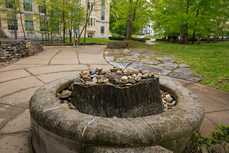 This fossilized stump northeast of Myers Hall was brought from a coal mine in Dugger, Indiana. It’s of the genus Sigillaria and is approximately 300 million years old. | Photo by Jeremy Hogan