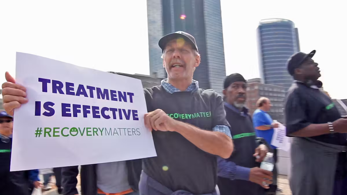Marchers celebrate National Recovery Month in Grand Rapids, Michigan. | Photo by <a href="https://www.flickr.com/photos/sacredheartrehab/15173561710/in/photolist-p7QtfW-27rXxBC-pnimPN-pp41Va-S3zEL3-CbHjig-2h4m9TE-D96W66-27rXxAL-CFYWwb-2h4oKL5-R9cAic-2h4oL3h-pninfh-2h4nZHE-2h4oKRR-2h4m9ED-R9cESH-pnimDh-2h4m9mN-QXFtr2-pp3ZGt-2h4oL1D-2h4nZTz-2oAQSr8-QyZHBY-LZNzgj-R9cD2i-2cqYiND-PUxY8p-f7izxQ-HRdXWU-R9cFd2-QXB1ix-2ojTUQi-2h4kKJb-2hQGWS3-CbHkg8-2ojUFCF-qsmpB6-D1PbJg-2ojPTAR-uRqk2e-vNhxTz-nCKoZG-2hQLtBT-D6Mppq-pqeL95-9TckNM-QXFtEZ" target="_blank">Sacred Heart/flickr</a> via <a href="https://creativecommons.org/licenses/by-sa/4.0/" target="_blank">CC BY-SA</a>