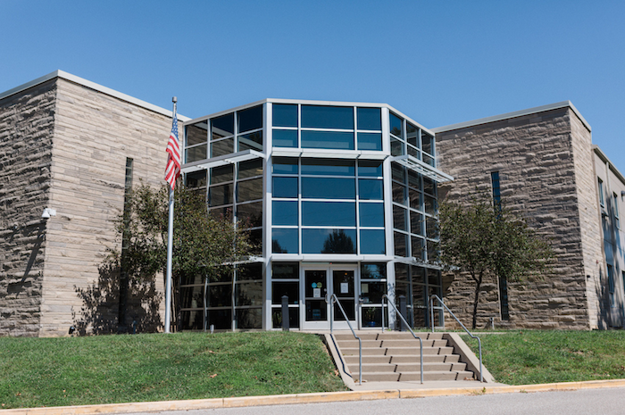 More than one-third of this year’s K-12 funding increase goes to private schools, which serve fewer than 8 percent of Hoosier students. “There’s nothing equitable about school funding in the state of Indiana,” Hauswald says. Above, the MCCSC Administrative Offices on North Drive. | Photo by Garrett Ann Walters