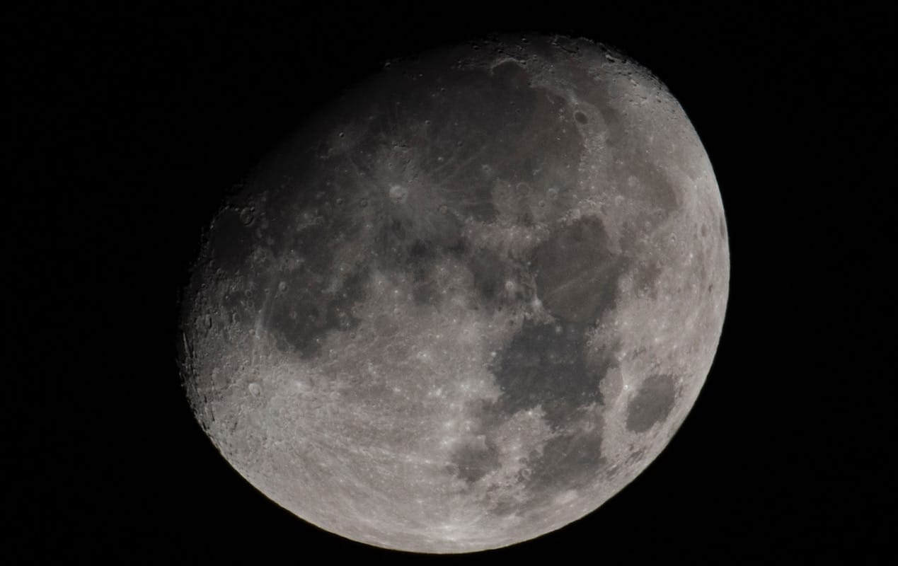 The half moon — I took this in my backyard. I like shooting the moon anytime, not just the full moon. I had been getting better at learning to set the timer to eliminate shake to get maximum detail on the surface. Tunnel Road, Unionville, Indiana