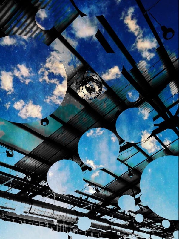 Woolery Mill sky — This is a double exposure of circular lantern lights hanging from the ceiling at the Woolery Mill in Bloomington. Adding the sky later. After putting them together, I noticed how the disco ball began to look like an eye.