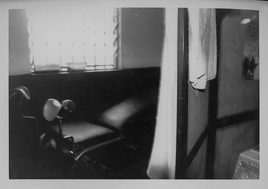La Table d’Opération (The Operation Table), N’Zerekore, Guinea, 2009, Gelatin Silver Print. An operation table used to repair fistulas. A fistula is a complication that results from Female Genital Mutilation, known in Guinea as L’excision.
