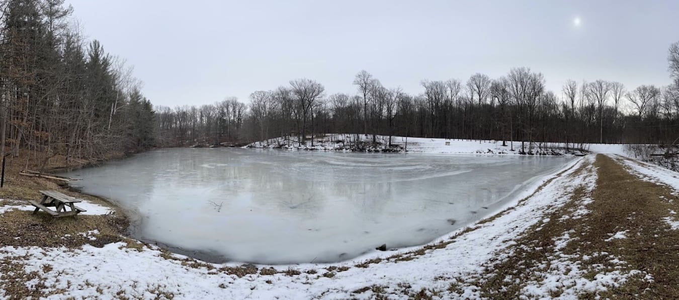 The first place Stosberg planned to filter and refill his water bottle was a lake, but it was frozen. He found a spot thawed just enough to get some water.