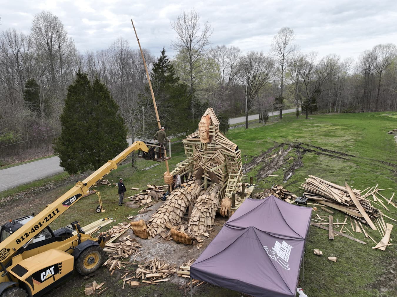 The Bear Hollow carvers constructed Otis’s fur from sawmill slabs of poplar and his face and feet from white-pine logs. | Photo provided